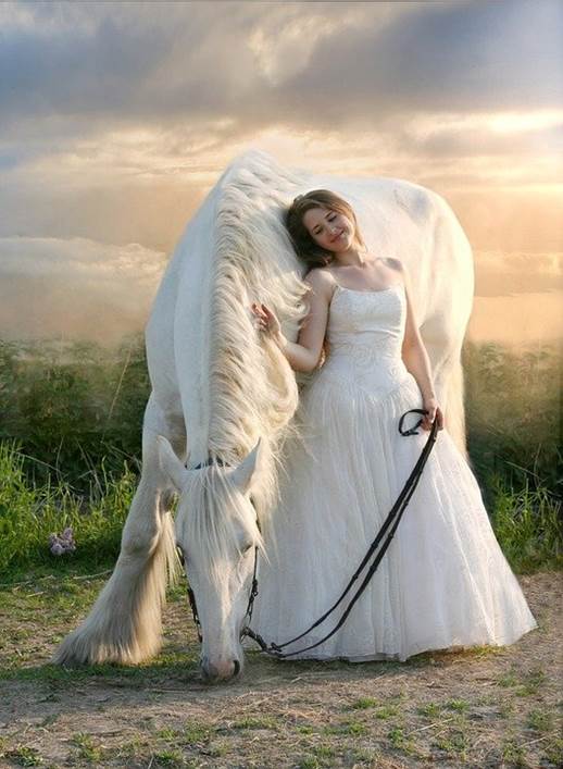 A woman posing with her horse